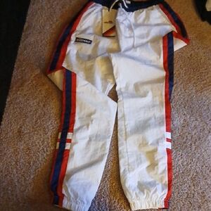 Ellesse White Joggers with Red and Blue Stripes